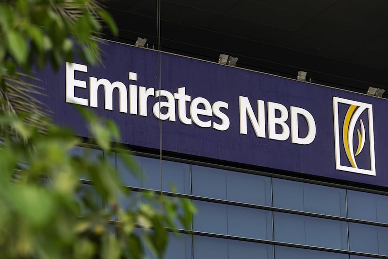 A logo sits on display outside the main office for the Emirates NBD PJSC bank in Dubai, United Arab Emirates, on Tuesday, Sept. 4, 2018. Abu Dhabi is engineering a second bank merger in its latest attempt to stay competitive in the era of lower oil prices. Photographer: Christopher Pike/Bloomberg