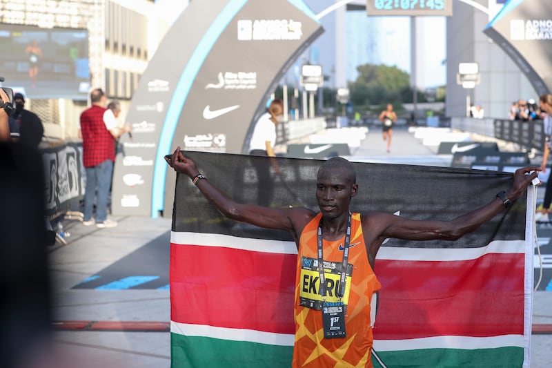 Titus Ekiru celebrates his win in the Adnoc Abu Dhabi Marathon.