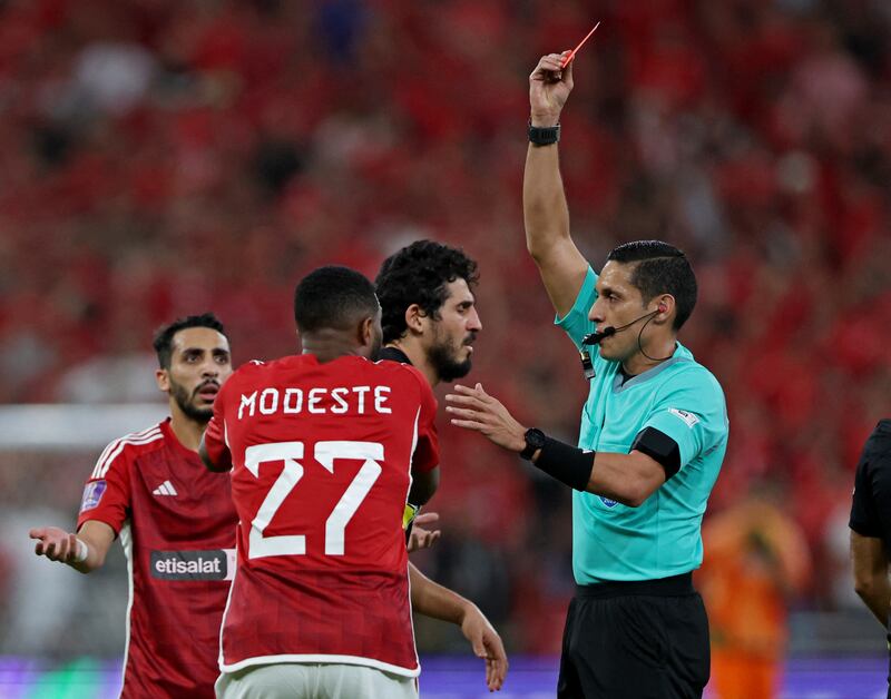 Ahly's Anthony Modeste is shown a red card by referee Jesus Valenzuela. Reuters