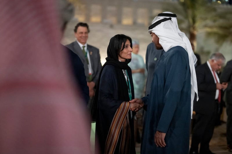 Sheikh Mohamed greets Razan Al Mubarak, UN Climate Change High-Level Champion for Cop28. Ministry of Presidential Affairs - Abu Dhabi