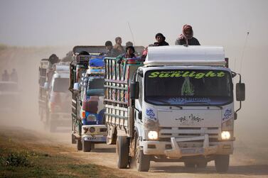 Trucks loaded with civilians near the village of Baghouz in eastern Syria on February 22, 2019. Reuters