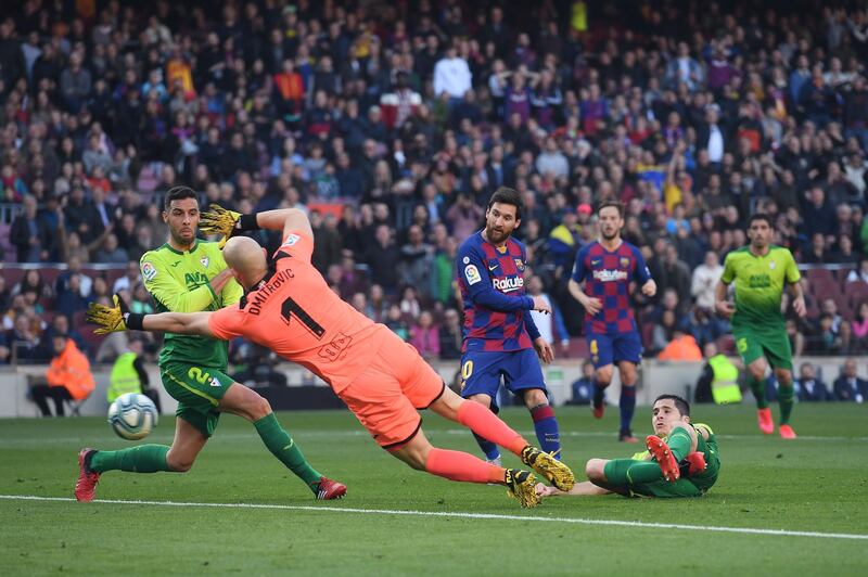 Lionel Messi scores against Eibar at Camp Nou. AFP