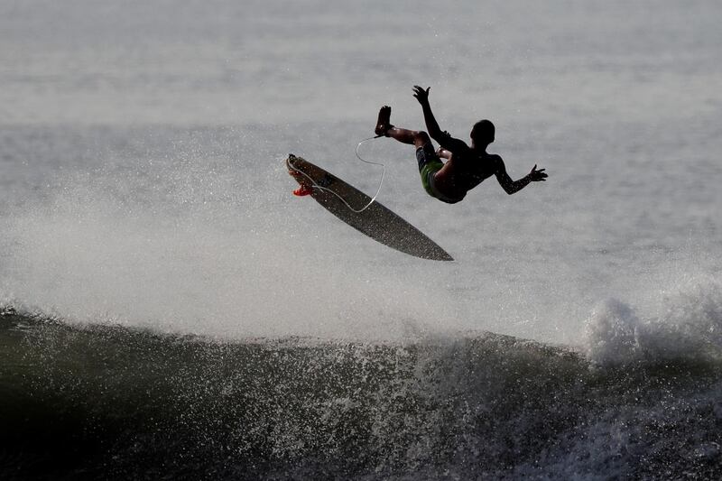 A surfer wipes out at El Paredon beach in Escuintla, Guatemala, on Saturday, February 1. EPA