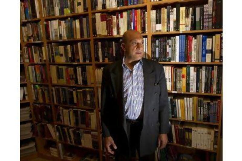 Munther Fahmi in his bookshop in East Jerusalem. Despite his high-profile connections, Mr Fahmi's days in the city of his birth may be numbered.