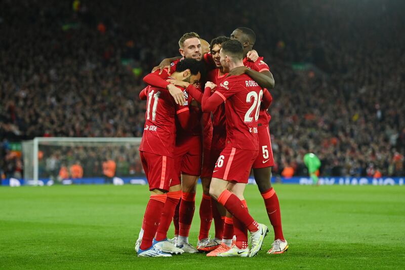 Jordan Henderson  celebrates with team-mates after the first goal. Getty
