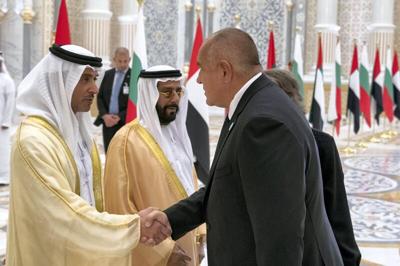 ABU DHABI, UNITED ARAB EMIRATES - October 21, 2018: HH Sheikh Hazza bin Zayed Al Nahyan, Vice Chairman of the Abu Dhabi Executive Council (L), greets HE Boyko Borissov, Prime Minister of Bulgaria (R), during a reception at the Presidential Palace. Seen with HH Sheikh Tahnoon bin Mohamed Al Nahyan, Ruler's Representative in Al Ain Region (C).

( Hamad Al Kaabi / Crown Prince Court - Abu Dhabi )
---