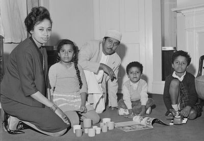 Jamshid bin Abdullah, the last Sultan of Zanzibar, in exile with his wife Sheikha Anisa bint Salim Al Said and children at the St James' Hotel, London, after the Zanzibar Revolution, 21st January 1964.  (Photo by Robertson/Express/Hulton Archive/Getty Images)