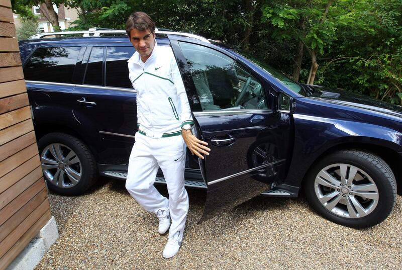 WIMBLEDON, ENGLAND - JUNE 19:  Roger Federer of Switzerland arrives at a press conference where Li Na was announced as global ambassador for Mercedes-Benz on June 19, 2011 in Wimbledon, England.  (Photo by Julian Finney/Getty Images)