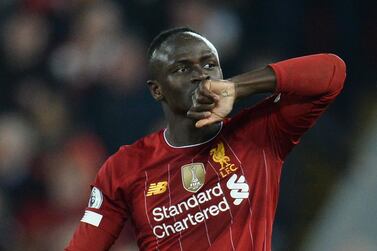 epa08094116 Liverpool's Sadio Mane celebrates scoring a goal during the English Premier league soccer match between Liverpool and Wolverhampton Wanderers held at Anfield in Liverpool, Britain, 29 December 2019. EPA/PETER POWELL EDITORIAL USE ONLY. No use with unauthorized audio, video, data, fixture lists, club/league logos or 'live' services. Online in-match use limited to 120 images, no video emulation. No use in betting, games or single club/league/player publications