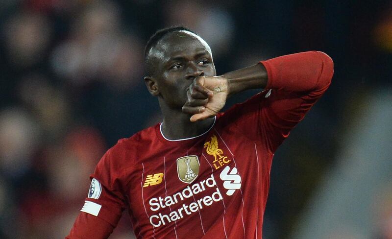 epa08094116 Liverpool's Sadio Mane celebrates scoring a goal during the English Premier league soccer match between Liverpool and Wolverhampton Wanderers held at Anfield in Liverpool, Britain, 29 December 2019.  EPA/PETER POWELL EDITORIAL USE ONLY. No use with unauthorized audio, video, data, fixture lists, club/league logos or 'live' services. Online in-match use limited to 120 images, no video emulation. No use in betting, games or single club/league/player publications