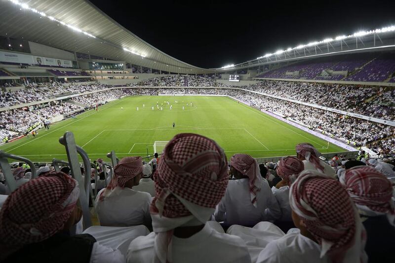 Crowd watching the Arabian Gulf League match between Al Dhafra and Al Ain at Hazza bin Zayed Stadium. Pawan Singh / The National 