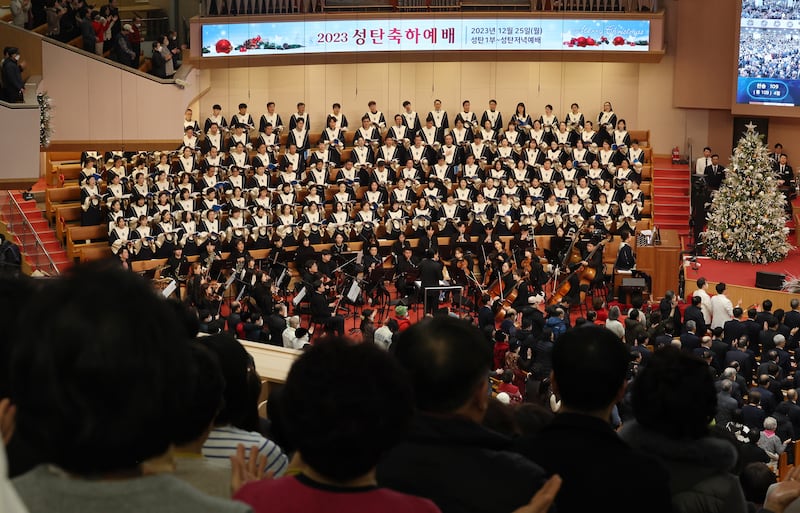 People attend a Christmas service at Yoido Full Gospel Church in central Seoul, South Korea. EPA