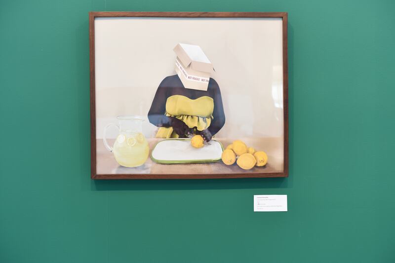 Artwork by Charlene Komuntale, titled 'Lemonade Dress (Not Fragile Series)' at Afia Art Gallery, is part of Simon Njami's curated section, Kind of Blue.