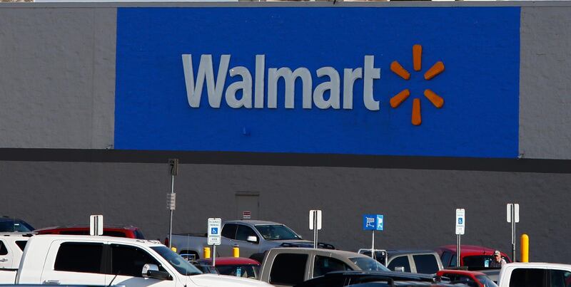 epa07772200 The new Walmart online and pickup location built onto the side of a existing Walmart in Sulphur Springs, Texas, USA, 13 August 2019. Walmart is converting some of their stores for customers to order and shop online and have convince of a pickup location.  EPA/LARRY W. SMITH