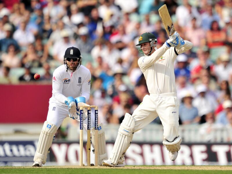 Australia's Michael Clarke (R) plays a shot during play on the fifth day of the fifth Ashes cricket test match between England and Australia at The Oval cricket ground in London on August 25, 2013. England were bowled out for 377 in reply to Australia's first innings 492 for nine declared, a deficit of 115 runs, on the final day of the fifth Ashes Test at The Oval on Sunday. AFP PHOTO / GLYN KIRK

RESTRICTED TO EDITORIAL USE. NO ASSOCIATION WITH DIRECT COMPETITOR OF SPONSOR, PARTNER, OR SUPPLIER OF THE ECB
 *** Local Caption ***  802740-01-08.jpg
