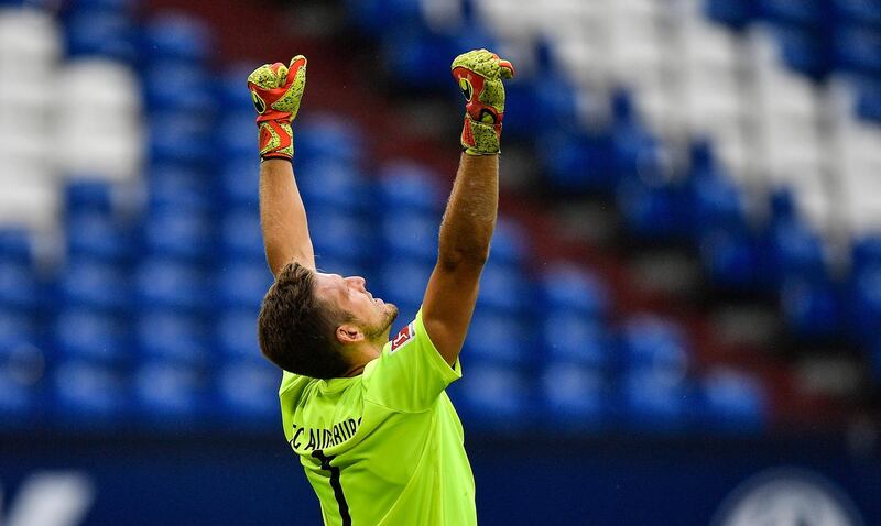 Augsburg's goalkeeper Andrea Luthe celebrates. EPA