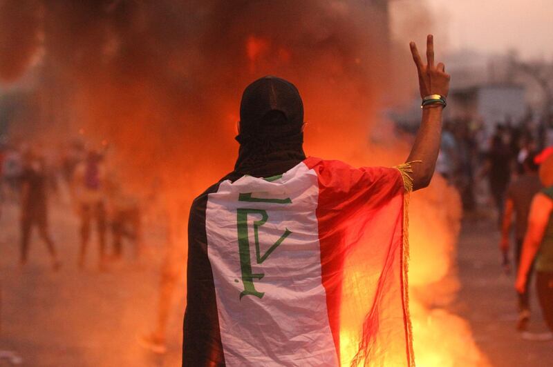 An Iraqi protester gestures in Tayaran Square in Baghdad. AFP