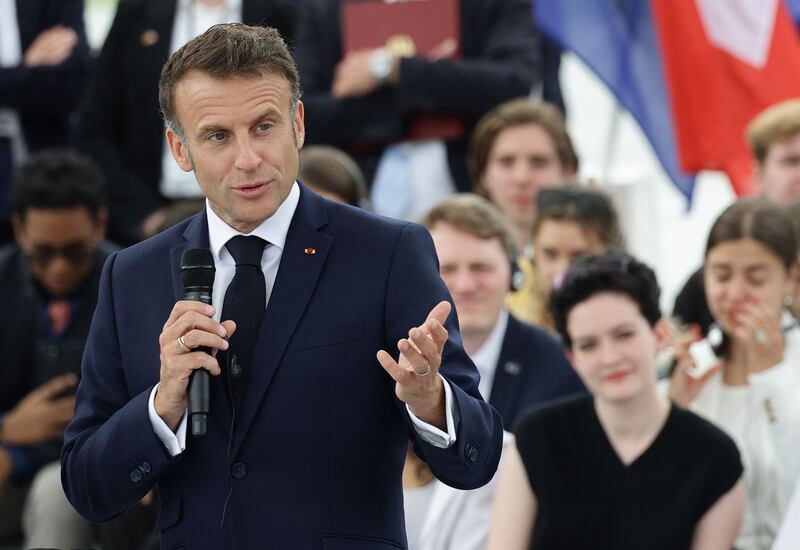 Mr Macron gives a speech. AFP
