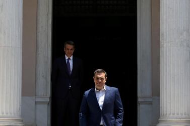 Outgoing Greek prime minister Alexis Tsipras leaving the Maximos Mansion after a meeting with newly-appointed Kyriakos Mitsotakis. Costas Baltas / Reuters