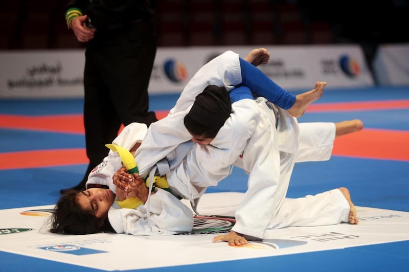 Latifa Ali Al Shamsi of UAE fights compatriot Boshra Ghanem Al Zadjali in their 38.5kg match at the Junior World Jiu-Jitsu Championship. Christopher Pike / The National