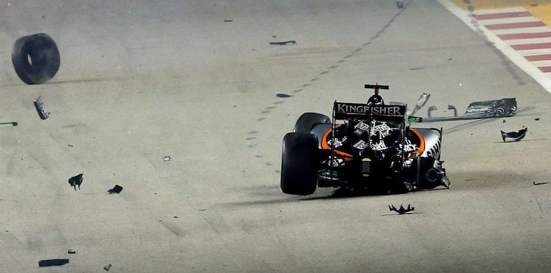 Nico Hulkenberg of Force India crashes at the start of the Formula One Singapore Grand Prix. Lynn Bo Bo / EPA