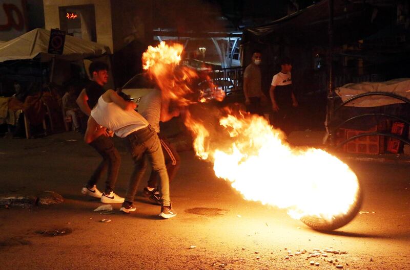 Palestinian protesters clash with Israeli troops at in the city center of the West Bank city of Hebron. Clashes erupted in Hebron during a demonstration in support of Palestinians in Jerusalem after Israeli police restricted access and gathering in areas around Damascus Gate of the Old City of Jerusalem, which led to nightly clashes between Palestinians and Israeli police.  EPA