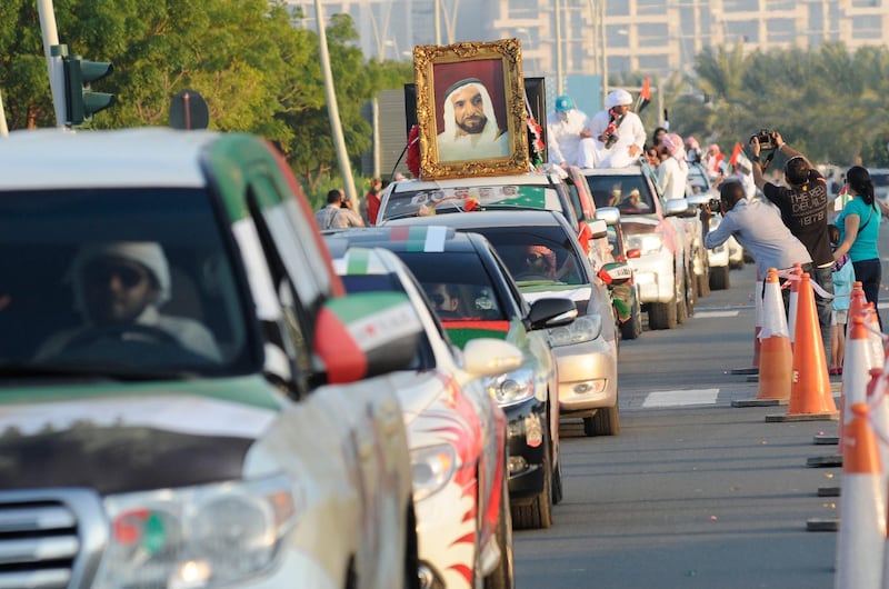 Cars and drivers take part of record breaking historyas embellished cars descend on Yas Island to attempta Guinness World Records title for the longest parade of decorated cars on the 42 National Day of the UAE. The event was organized by The Life & Style Show UAE on Monday, Dec. 02, 2013 in Abu Dhabi, United Arab Emirates. Photo: Charles Crowell for The National   *** Local Caption ***  cc1202-cars-036.JPG