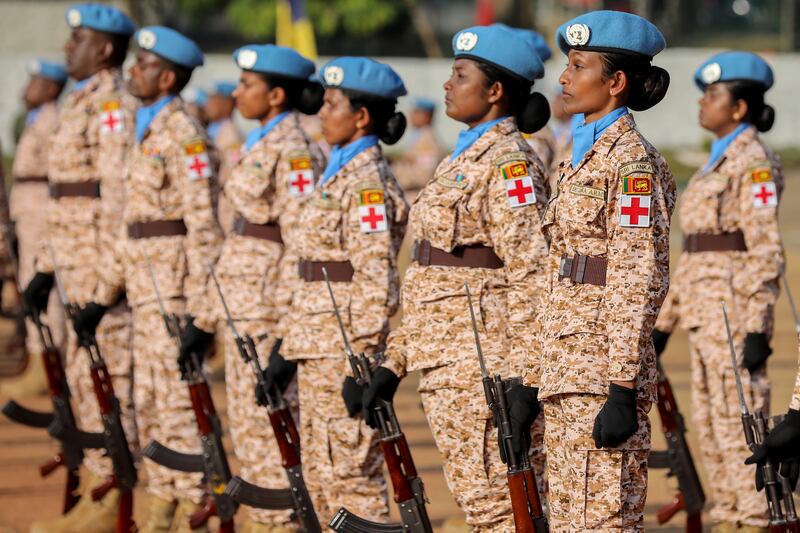 Sri Lankan soldiers in Colombo participate in a passing-out parade before they leave for UN peace-keeping duties in Sudan. December 24 2021. EPA