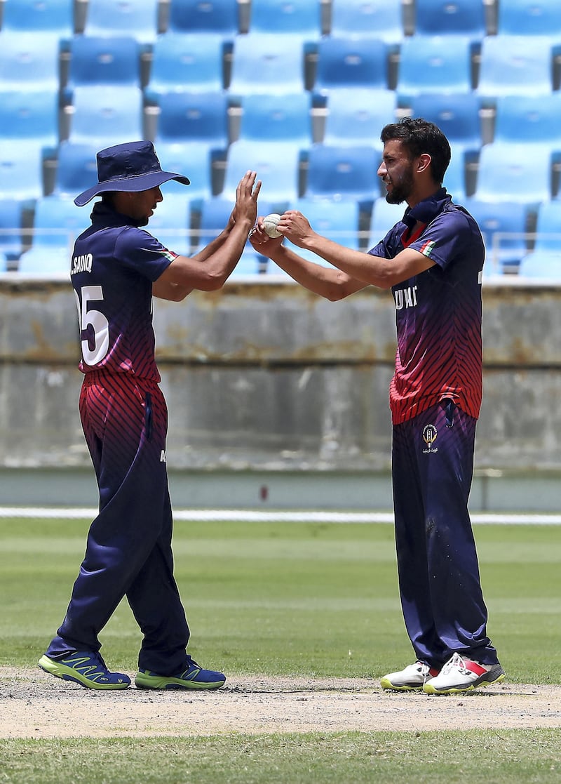 DUBAI,  UNITED ARAB EMIRATES , May 3 – 2019 :- Nomaan Sidiq (left) from Kuwait celebrating after Vriitya Aravind from UAE run out during the final of ACC Under 19 Western Region cricket match between UAE vs Kuwait held at Dubai International Cricket Stadium in Dubai. ( Pawan Singh / The National ) For News. Story by Paul 