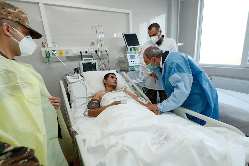 Armenian Prime Minister Nikol Pashinyan visits Armenian servicemen who were wounded in the Nagorno-Karabakh during military combat with Azerbaijani Armed Forces.  EPA/ARMENIAN GOVERNMENT