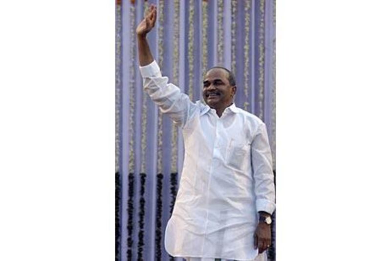 Yeduguri Sandinti Rajasekhara Reddy greets supporters during his swearing-in ceremony in Hyderabad last May.