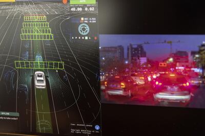 Vehicle data and trip video recorded from a vehicle is displayed on a monitor at the Pony.ai Inc. office in the Nansha district of Guangzhou, Guangdong Province, China, on Wednesday, April 10, 2019. Domestic and foreign testers are putting cars, buses, trucks and delivery vans through self-driving trials to teach them how to navigate the notoriously congested streets of the world's biggest auto market. Photographer: Qilai Shen/Bloomberg