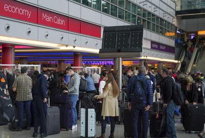 Passengers at Heathrow Airport in London. Airport fees are charged to airlines but are generally passed down to passengers in fare prices. PA
