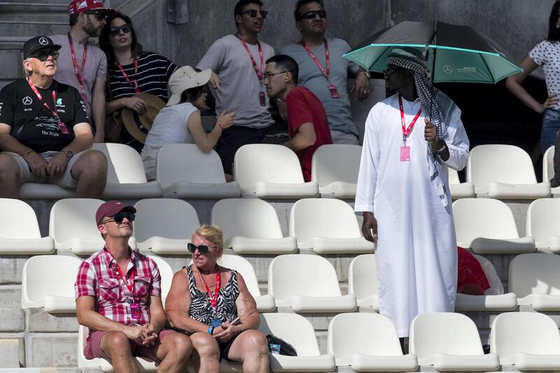 Abu Dhabi, United Arab Emirates, November 24, 2017:    Fans take in the first practise session for the Abu Dhabi Formula One Grand Prix at Yas Marina Circuit in Abu Dhabi on November 24, 2017. Christopher Pike / The National

Reporter: Graham Caygill
Section: Sport