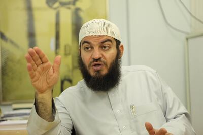 Sheikh Haitham Al-Haddad of the Islamic Sharia Council in the room they use for counselling (they try not to call it a court) in the Masjid & Madrasah al-Tawhid (Mosque) in Leyton, east London, while their own building is being re-built.  Photograph by Jonathan Player for The National, November 23rd 2009.