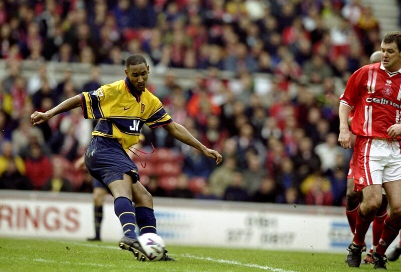 24 Apr 1999:  Nicolas Anelka shoots past Gary Pallister of Middlesbrough to score Arsenal's 6th goal in the FA Carling Premiership match at the Riverside Stadium in Middlesbrough, England. Arsenal won 6-1. \ Mandatory Credit: Clive Brunskill /Allsport