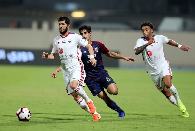 Sharjah, United Arab Emirates - May 15, 2019: Football. Sharjah's Alhasan Saleh goes on the attack during the game between Sharjah and Al Wahda in the Arabian Gulf League. Wednesday the 15th of May 2019. Sharjah Football club, Sharjah. Chris Whiteoak / The National