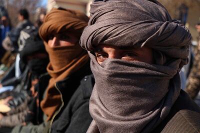 epaselect epa07348206 Former Taliban militants surrender their weapons during a reconciliation ceremony in Herat, Afghanistan, 06 February 2019. A group of ten former Taliban militants from Gozara district surrendered  their weapons in Herat on 06 February and joined the peace process. Under an amnesty launched by former Afghan President Hamid Karzai and backed by the US in November 2004, hundreds of anti-government militants have surrendered to the government.  EPA/JALIL REZAYEE