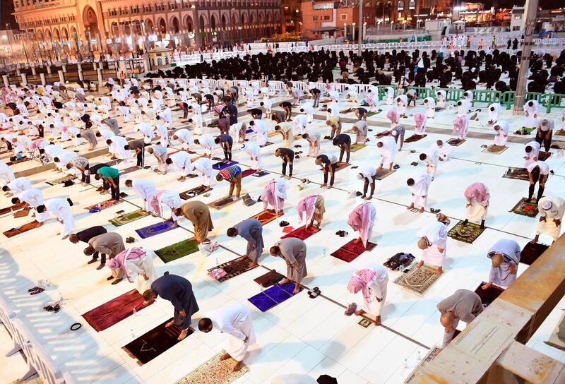 Worshippers seek Laylat Al Qadr as they offer late-night prayers at the Grand Mosque, in Makkah, Saudi Arabia. Laylat Al Qadr or the Night of Destiny is the holiest night for Muslims in the last 10 days of the fasting month. SPA