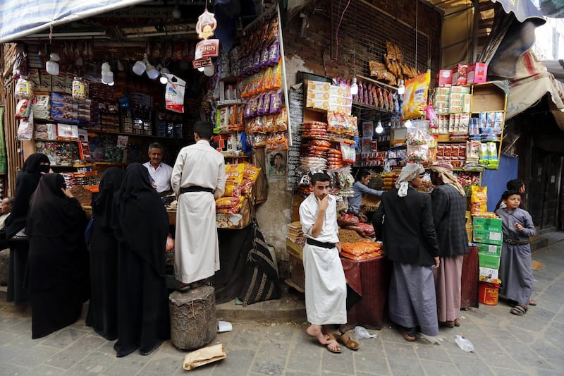 Yemenis shop for the Eid Al Fitr, marking the end of the Muslim fasting month of Ramadan, at a market in the old quarter of Sana'a, Yemen.  EPA