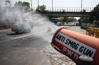 An anti-smog gun on a road in New Delhi in 2021.  AFP
