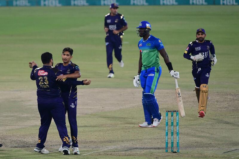 Quetta Gladiators' Mohammad Hasnain celebrates after taking the wicket of Multan Sultans' Carlos Brathwaite. AFP