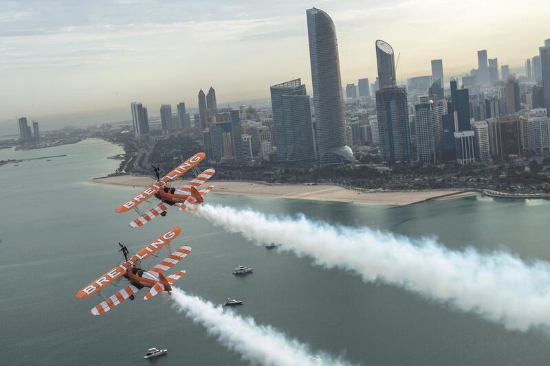 The Breitling Wingwalkers soar over Abu Dhabi corniche. Courtesy Breitling