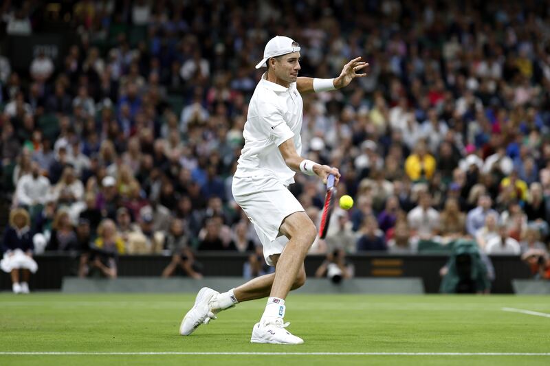USA's John Isner in action against Great Britain's Andy Murray. PA