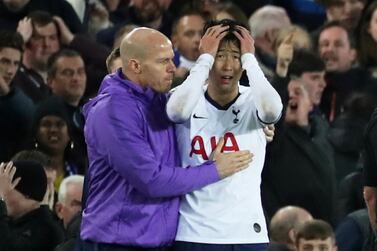 Tottenham Hotspur's Son Heung-min is consoled by club staff after his tackle on Andre Gomes left the Everton midfielder with a dislocated ankle. Reuters