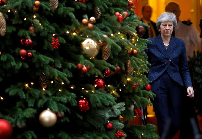 Theresa May walks out of 10 Downing Street to address the media. Reuters