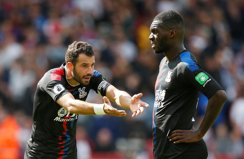 Soccer Football - Premier League - Sheffield United v Crystal Palace - Bramall Lane, Sheffield, Britain - August 18, 2019  Crystal Palace's Luka Milivojevic gestures as Christian Benteke looks on  REUTERS/Andrew Yates  EDITORIAL USE ONLY. No use with unauthorized audio, video, data, fixture lists, club/league logos or "live" services. Online in-match use limited to 75 images, no video emulation. No use in betting, games or single club/league/player publications.  Please contact your account representative for further details.