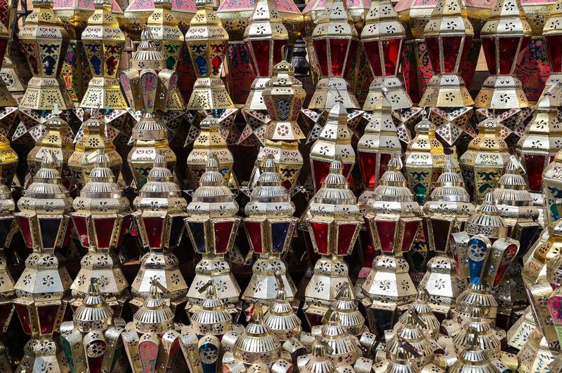 Traditional lanterns known in Arabic as "Fanous" are displayed in Cairo's Sayeda Zainab neighbourhood ahead of the Muslim holy month of Ramadan, on April 17, 2020. - From cancelled iftar feasts to suspended mosque prayers, Muslims across the Middle East are bracing for a bleak month of Ramadan fasting as the threat of the COVID-19 pandemic lingers. Ramadan is a period for both self reflection and socialising. Believers fast from dawn to dusk and then gather around a family or community meal each evening of Islam's holiest month, which begins later this week and ends with Eid al-Fitr festivities. (Photo by Mohamed el-Shahed / AFP)