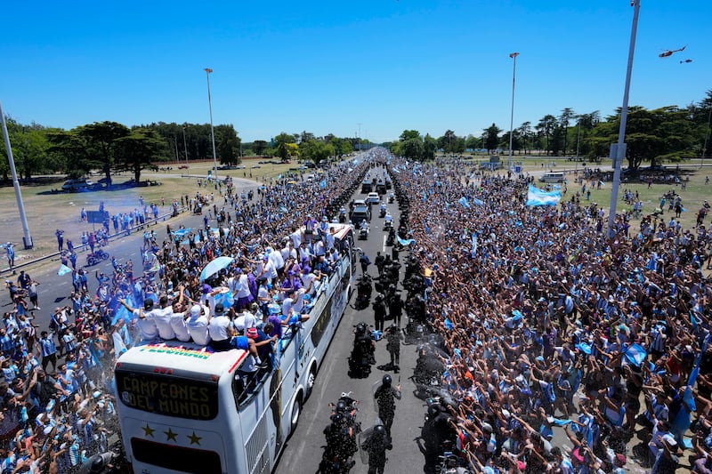 Argentina team are welcomed home by adoring fans in Buenos Aires. AP