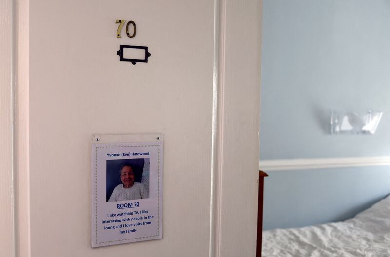 Information about Yvonne (Eve) Harewood, 83, on the door of her bedroom at the Peartree Care Home in London. Harewood, who is originally from Singapore, watched the event on television with her sister and her school friends